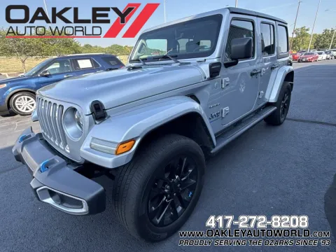 Silver 2023 Jeep Wrangler Sahara 4xe for sale in Branson West, MO