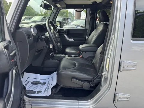 Photos of 2015 Jeep Wrangler Unlimited Sahara for sale in Durham, NC at Premier Auto Group