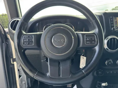 Another view of 2015 Jeep Wrangler Unlimited Sahara for sale in Durham, NC at Premier Auto Group