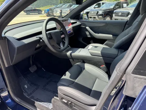 Photos of 2026 Tesla Model Y Long Range Sport Utility 4D for sale in Durham, NC at Premier Auto Group