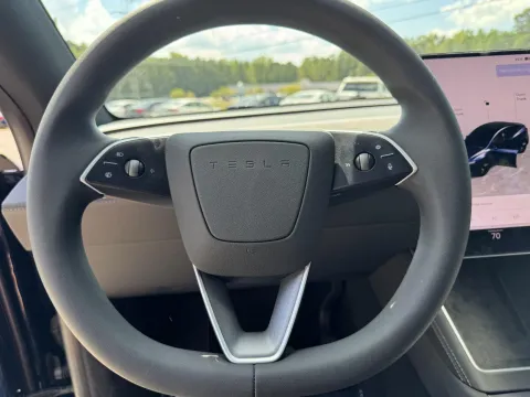 Another view of 2026 Tesla Model Y Long Range Sport Utility 4D for sale in Durham, NC at Premier Auto Group
