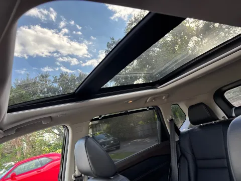 Photos of 2023 Nissan Rogue SV AWD w/PREMIUM PKG. LTHR. PANO. for sale in Seffner, FL at Evo Motors