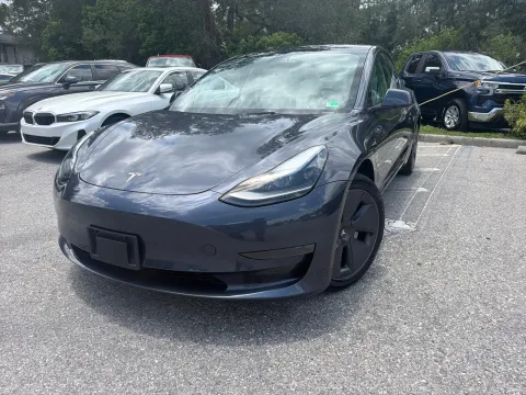 Photos of 2023 Tesla Model 3 Standard Range w/WHITE INTERIOR for sale in Seffner, FL at Evo Motors