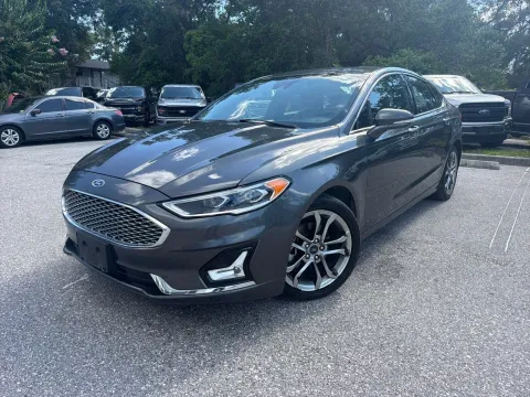 Photos of 2020 Ford Fusion Hybrid Titanium for sale in Seffner, FL at Evo Motors