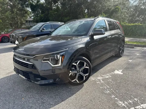 Photos of 2023 Kia Niro EX Touring for sale in Seffner, FL at Evo Motors