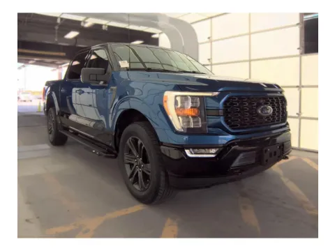 Photos of 2023 Ford F-150 XLT Crew Cab 4X4 V8 HERITAGE EDITION W/SPORT APPEARANCE PKG. for sale in Seffner, FL at Evo Motors