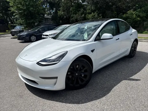 Photos of 2021 Tesla Model 3 Standard Range Plus for sale in Seffner, FL at Evo Motors