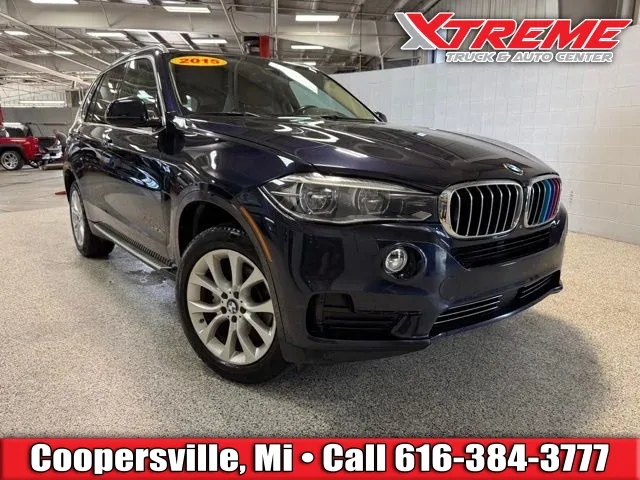 Blue 2015 BMW X5 xDrive35i for sale in Coopersville, MI