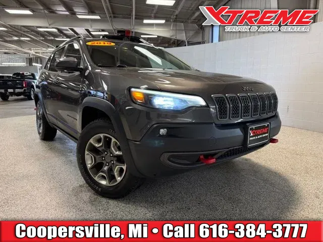 Gray 2019 Jeep Cherokee Trailhawk for sale in Coopersville, MI