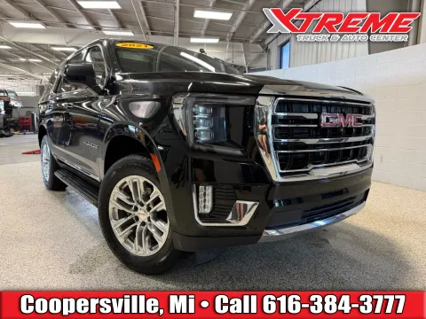 Black 2021 GMC Yukon SLT for sale in Coopersville, MI