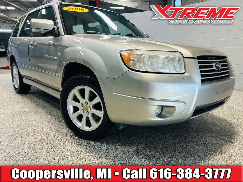 Gold 2006 Subaru Forester 2.5X for sale in Coopersville, MI