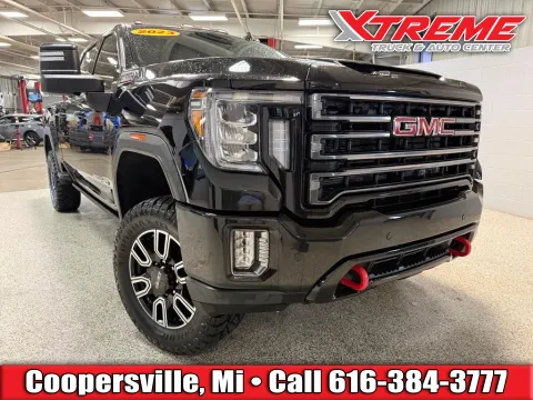Black 2023 GMC Sierra 2500HD AT4 for sale in Coopersville, MI