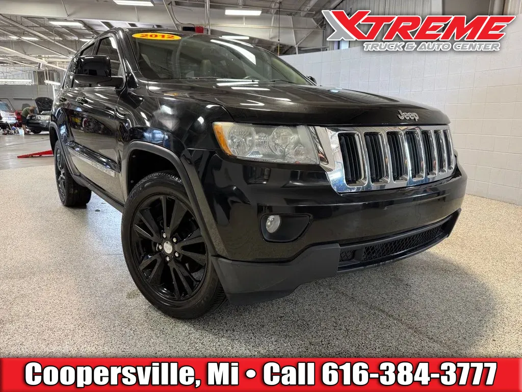 Black 2012 Jeep Grand Cherokee Laredo for sale in Coopersville, MI