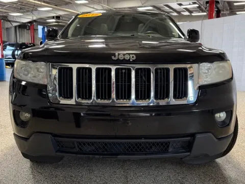 Photos of 2012 Jeep Grand Cherokee Laredo for sale in Coopersville, MI at Xtreme Truck & Auto Center