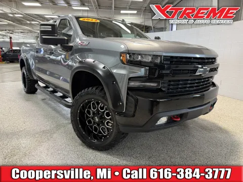 Gray 2022 Chevrolet Silverado 1500 LTD LT Trail Boss for sale in Coopersville, MI