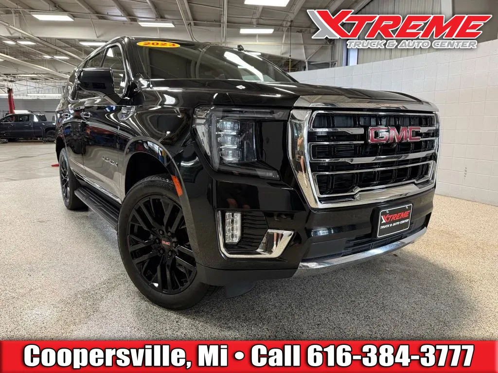 Black 2023 GMC Yukon SLT for sale in Coopersville, MI