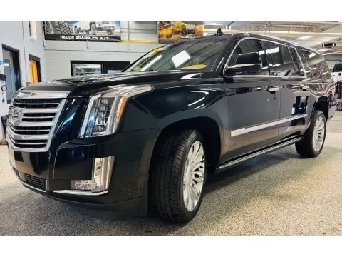 Another view of 2016 Cadillac Escalade ESV Platinum Edition for sale in Coopersville, MI at Xtreme Truck & Auto Center