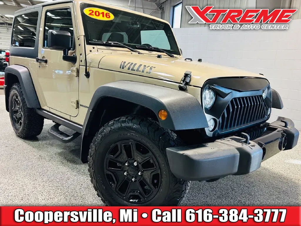 Brown 2016 Jeep Wrangler Sport for sale in Coopersville, MI