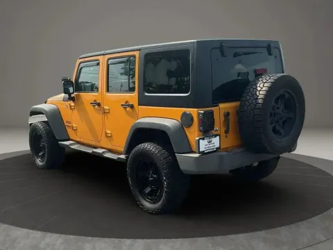 Another view of 2013 Jeep Wrangler Unlimited Sport SUV 4D for sale in Altavista, VA at DNX Motors Altavista