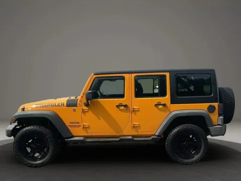 Photos of 2013 Jeep Wrangler Unlimited Sport SUV 4D for sale in Altavista, VA at DNX Motors Altavista