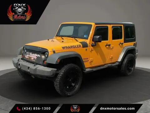 Yellow 2013 Jeep Wrangler Unlimited Sport SUV 4D for sale in Altavista, VA