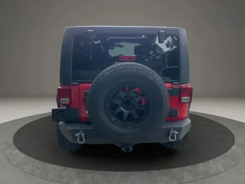Another view of 2013 Jeep Wrangler Unlimited Sport S SUV 4D for sale in Altavista, VA at DNX Motors Altavista