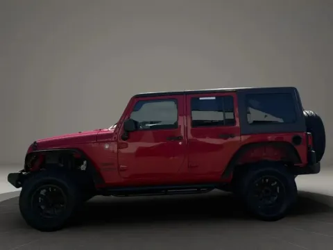 Photos of 2013 Jeep Wrangler Unlimited Sport S SUV 4D for sale in Altavista, VA at DNX Motors Altavista