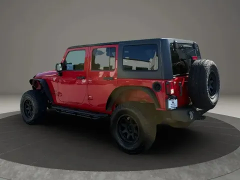 Another view of 2013 Jeep Wrangler Unlimited Sport S SUV 4D for sale in Altavista, VA at DNX Motors Altavista