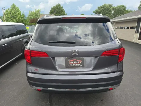 More photos of 2016 HONDA PILOT TOURING at Fast Lane Autos, IN