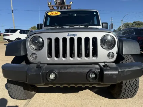 Photos of 2016 JEEP WRANGLER UNLIMI SPORT for sale in Springdale, AR at Taylor Auto Sales, Inc.
