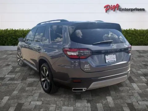 Photos of 2025 HONDA PILOT ELITE AWD for sale in Prattville, AL at Pigg Enterprises
