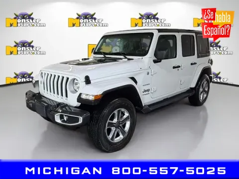 Orange 2021 Jeep Wrangler Unlimited Sahara for sale in Michigan Center, MI