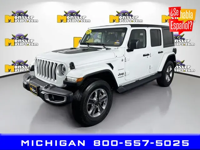 Orange 2021 Jeep Wrangler Unlimited Sahara for sale in Michigan Center, MI