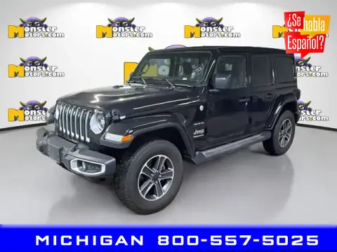 Black 2023 Jeep Wrangler Sahara for sale in Michigan Center, MI