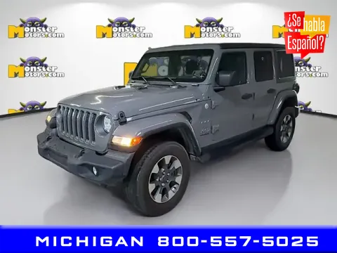 Gray 2021 Jeep Wrangler Unlimited Sahara for sale in Michigan Center, MI