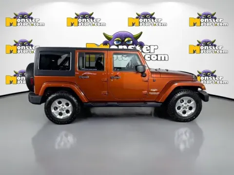 More photos of 2014 Jeep Wrangler Unlimited Sahara at Monster Motors - Jackson, MI, MI