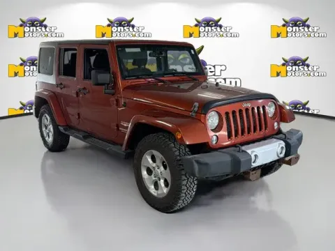 Another view of 2014 Jeep Wrangler Unlimited Sahara for sale in Michigan Center, MI at Monster Motors - Jackson, MI
