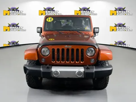 Photos of 2014 Jeep Wrangler Unlimited Sahara for sale in Michigan Center, MI at Monster Motors - Jackson, MI