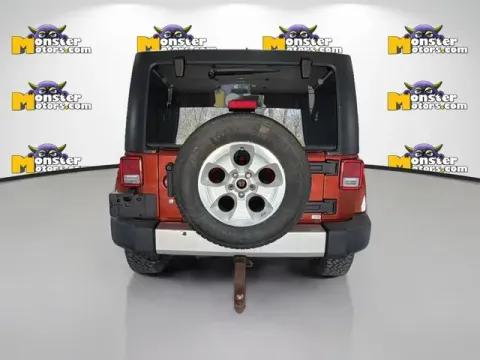 More photos of 2014 Jeep Wrangler Unlimited Sahara at Monster Motors - Jackson, MI, MI
