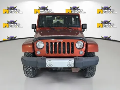 Photos of 2014 Jeep Wrangler Unlimited Sahara for sale in Michigan Center, MI at Monster Motors - Jackson, MI