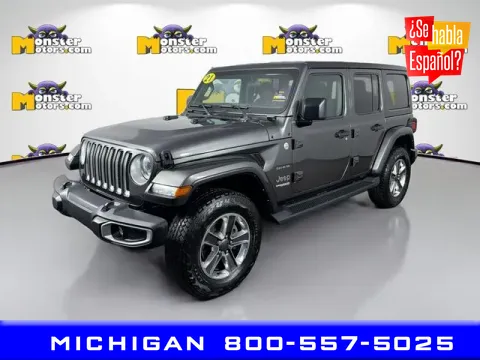 Gray 2021 Jeep Wrangler Unlimited Sahara for sale in Michigan Center, MI