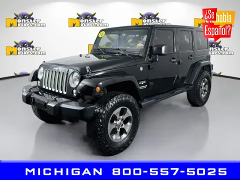Black 2016 Jeep Wrangler Unlimited Sahara for sale in Michigan Center, MI