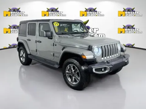 Another view of 2019 Jeep Wrangler Unlimited Sahara for sale in Michigan Center, MI at Monster Motors - Jackson, MI