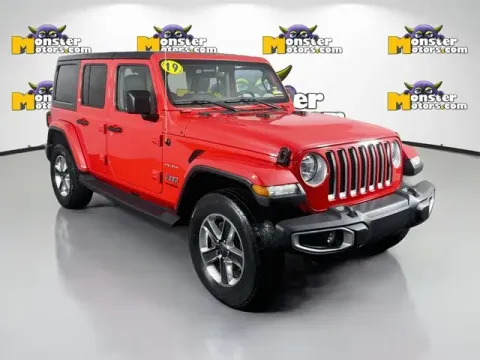 Another view of 2019 Jeep Wrangler Unlimited Sahara for sale in Michigan Center, MI at Monster Motors - Jackson, MI