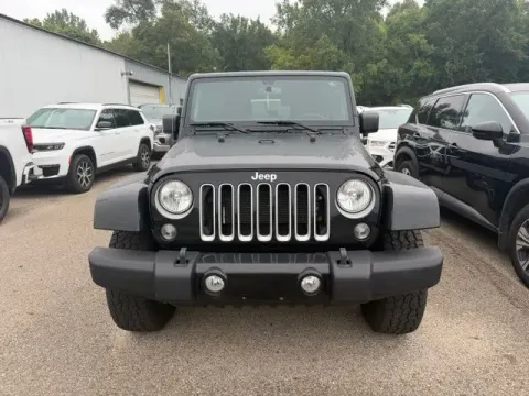 Photos of 2018 Jeep Wrangler JK Unlimited Sahara for sale in Michigan Center, MI at Monster Motors - Jackson, MI