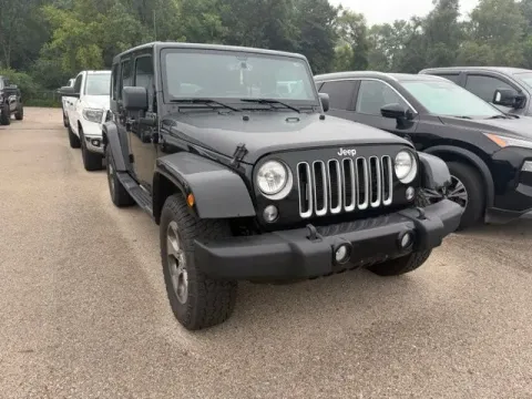 Another view of 2018 Jeep Wrangler JK Unlimited Sahara for sale in Michigan Center, MI at Monster Motors - Jackson, MI