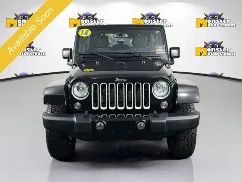 Photos of 2018 Jeep Wrangler JK Unlimited Sahara for sale in Michigan Center, MI at Monster Motors - Jackson, MI