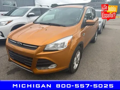 Gold 2016 Ford Escape SE for sale in Michigan Center, MI