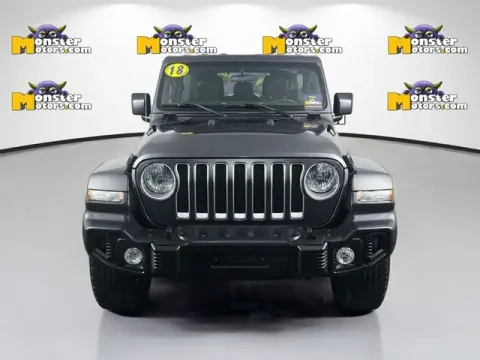 Photos of 2018 Jeep Wrangler Unlimited Sahara for sale in Michigan Center, MI at Monster Motors - Jackson, MI