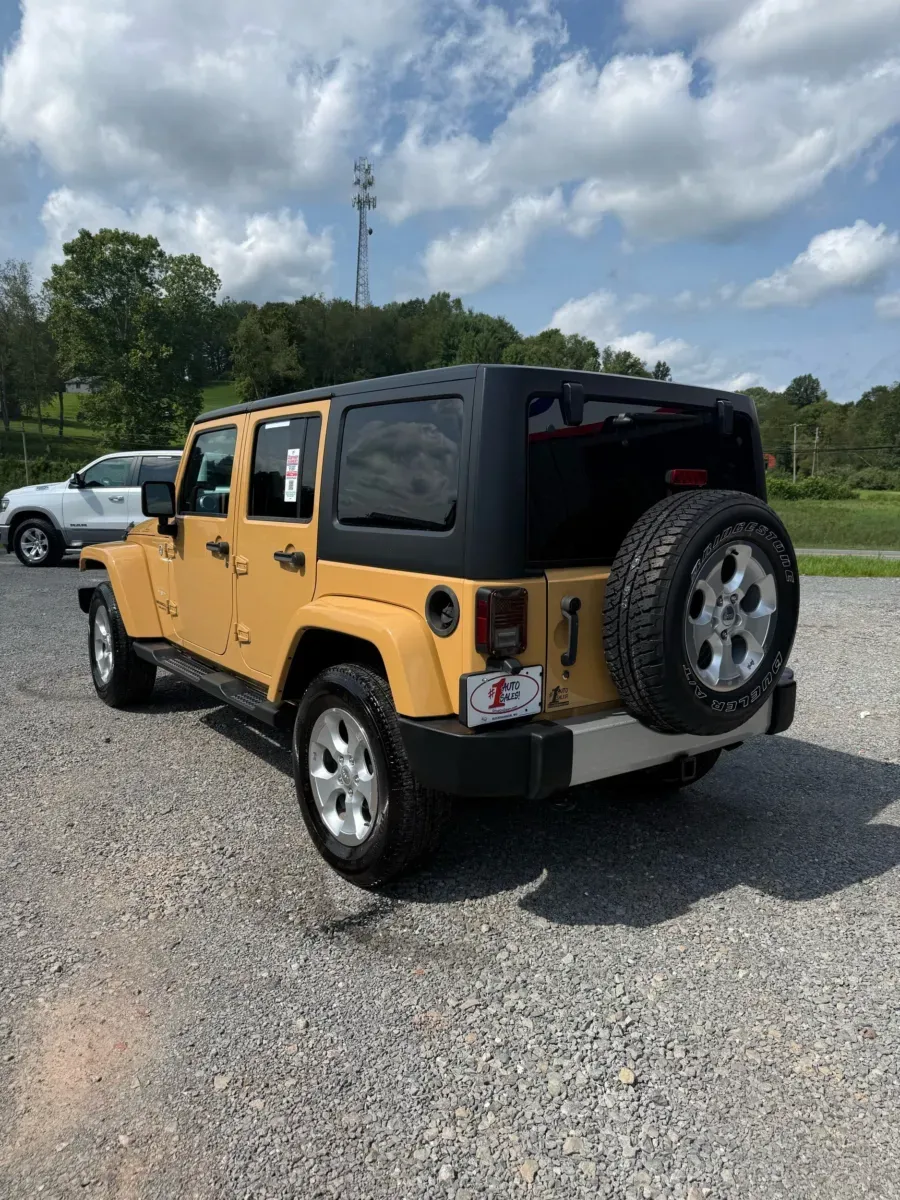 Another view of 2014 Jeep Wrangler Unlimited Sahara Unlimited 4x4 for sale in Buckhannon, WV at Number One Auto Sales